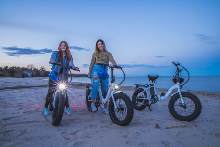 a person sitting on a motorcycle