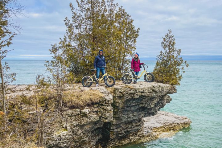 a man that is standing in the water